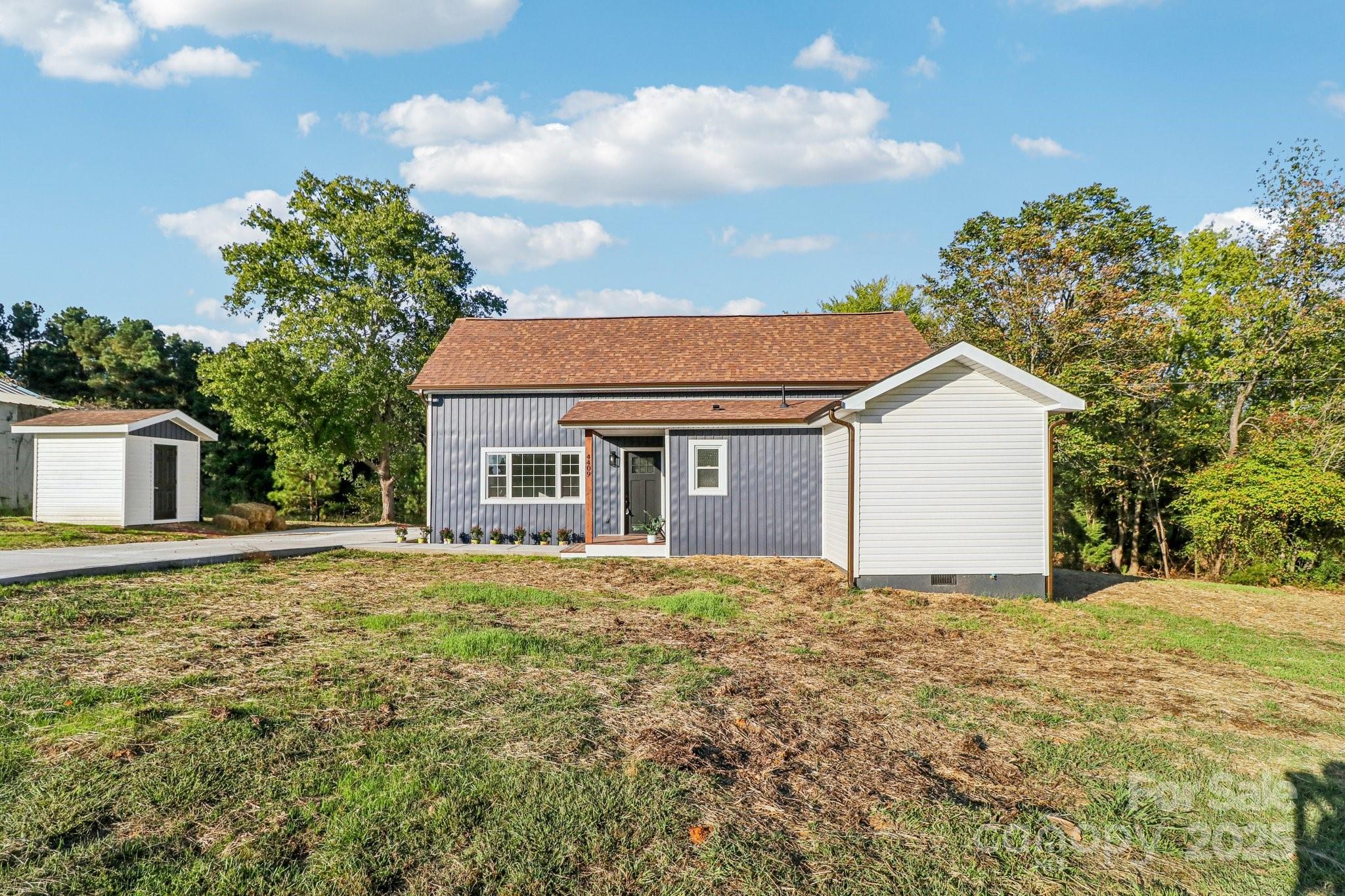 4409 Pleasant Road Lancaster, SC 29720 - Photo 32 of 34 a front view of house with yard and trees