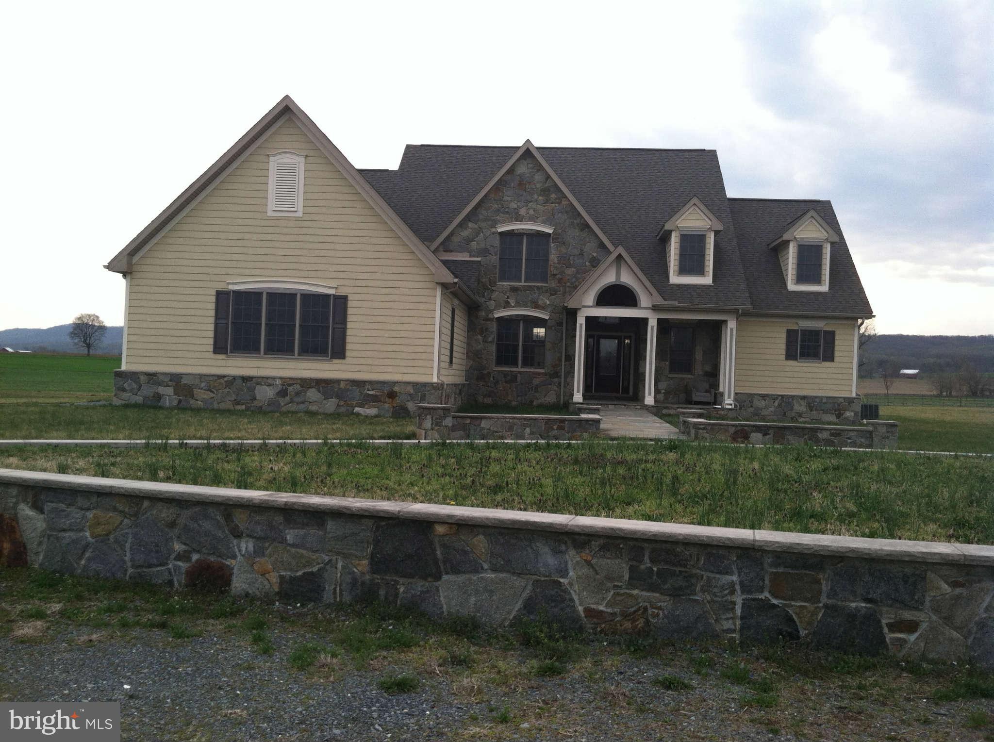 4613 Cap Stine Road Frederick, MD 21703 - Photo 1 of 1 a front view of a house with a yard