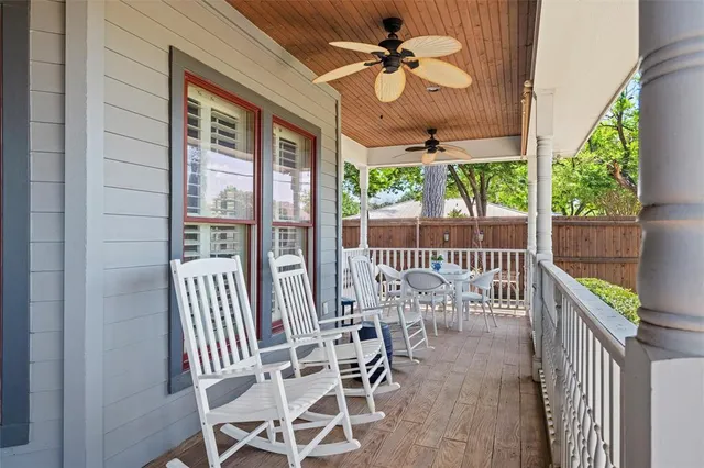 a view of a balcony with furniture