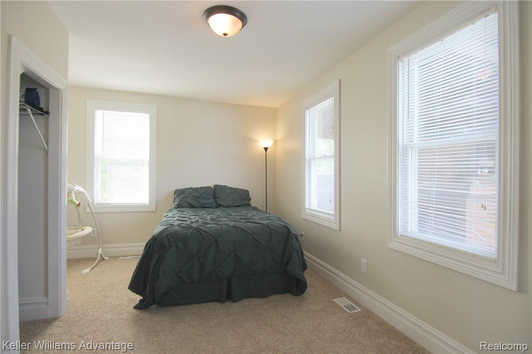 7171 North Fowlerville Road Fowlerville, MI 48836 - Photo 11 of 23 jFowlerville Rd Lower bedroom.jpg