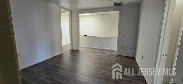 523 State Street Perth Amboy, NJ 08861 - Photo 4 of 22 a view of a hallway with wooden floor