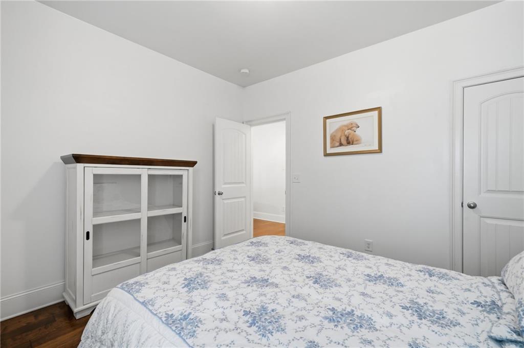 515 Sunset Street Canton, GA 30114 - Photo 37 of 64 a bedroom with a bed and a window