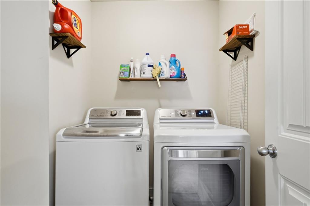 515 Sunset Street Canton, GA 30114 - Photo 39 of 64 a utility room with dryer and washer