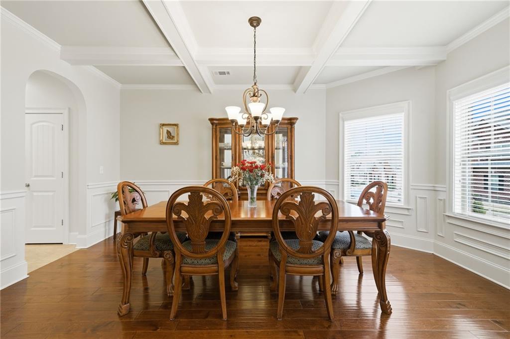 515 Sunset Street Canton, GA 30114 - Photo 4 of 64 a view of a dining room with furniture window and wooden floor