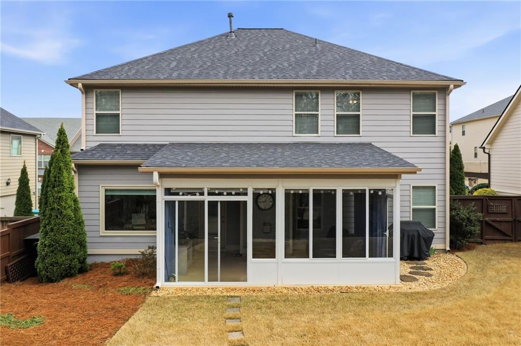 515 Sunset Street Canton, GA 30114 - Photo 46 of 64 a front view of a house with a yard