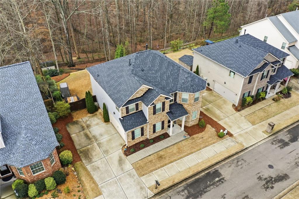 515 Sunset Street Canton, GA 30114 - Photo 48 of 64 an aerial view of a house with roof deck and furniture
