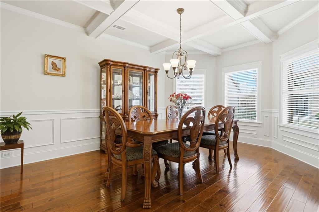 515 Sunset Street Canton, GA 30114 - Photo 5 of 64 a view of a dining room with furniture window and wooden floor
