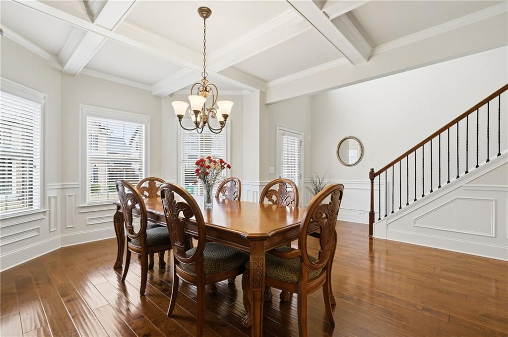 515 Sunset Street Canton, GA 30114 - Photo 6 of 64 a view of a dining room with furniture window and wooden floor
