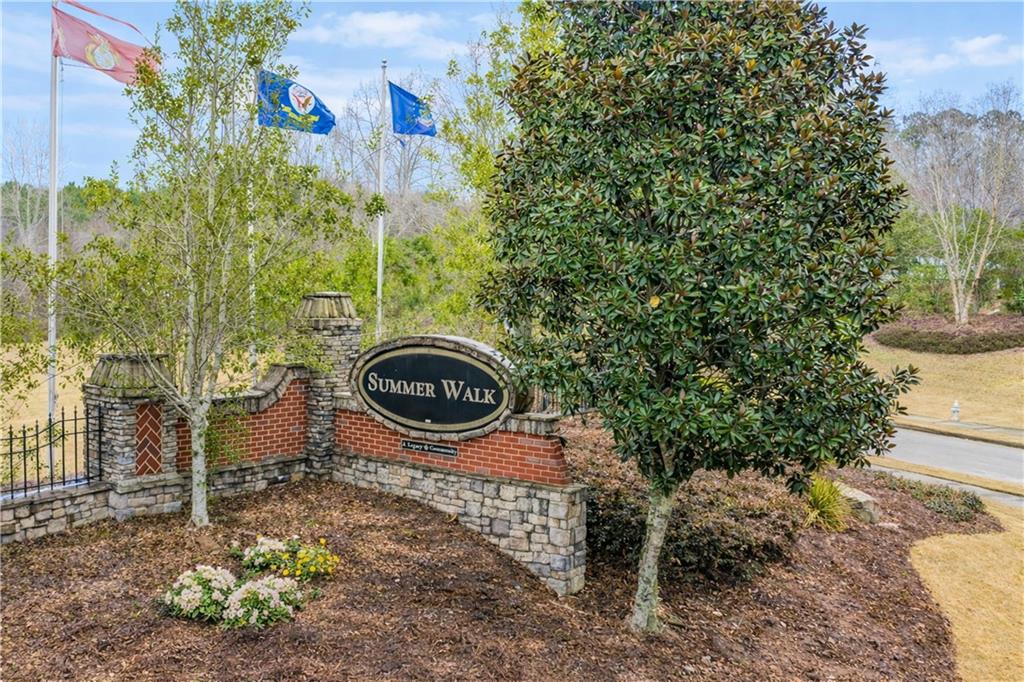 515 Sunset Street Canton, GA 30114 - Photo 64 of 64 a backyard of a house with lots of green space