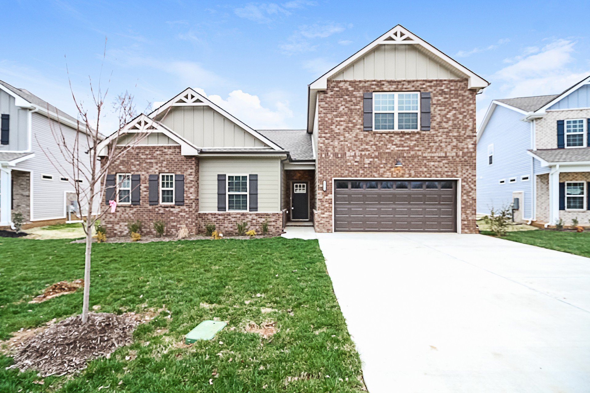 4018 Ella Cook Circle Murfreesboro, TN 37129 - Photo 1 of 17 a front view of a house with a yard