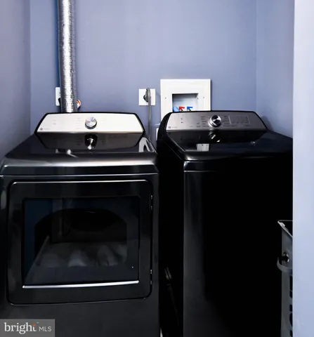 a bathroom with a sink and cabinets