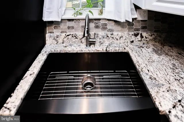 a close view of kitchen countertops and stove