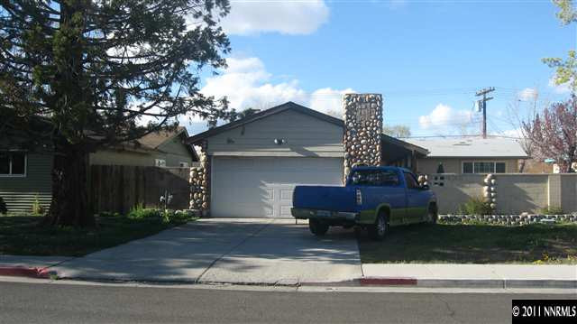 1465 Roberts Street Reno, NV 89502 - Photo 3 of 13 a house view with a sitting space fire pit and outdoor space