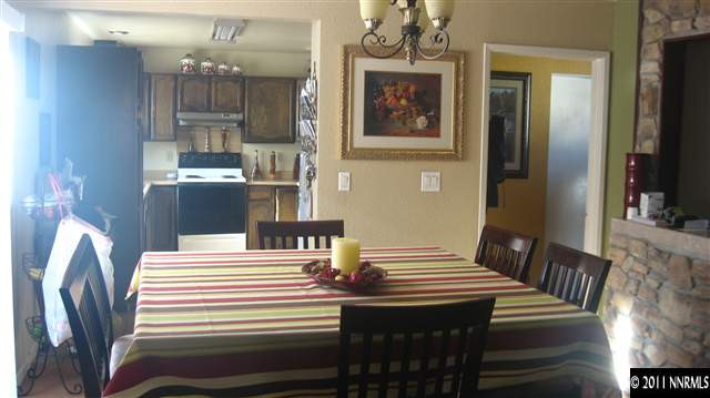 1465 Roberts Street Reno, NV 89502 - Photo 10 of 13 a view of a dining room with furniture and wooden floor