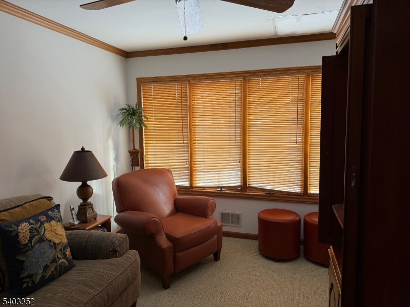 159 Wyoming Avenue Union, NJ 07083 - Photo 14 of 23 a living room with furniture and a window