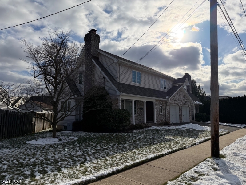 159 Wyoming Avenue Union, NJ 07083 - Photo 2 of 23 a front view of a house with garden