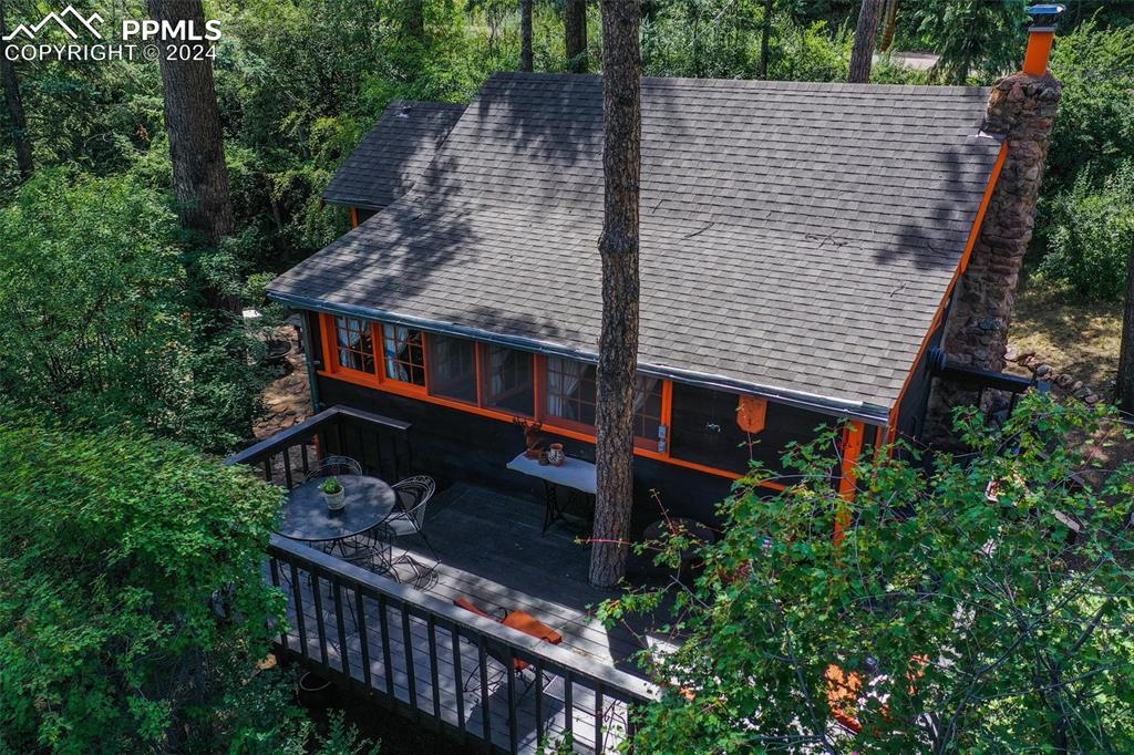 6015 Sioux Trail Cascade, CO 80809 - Photo 4 of 50 an outdoor view of house with swimming pool