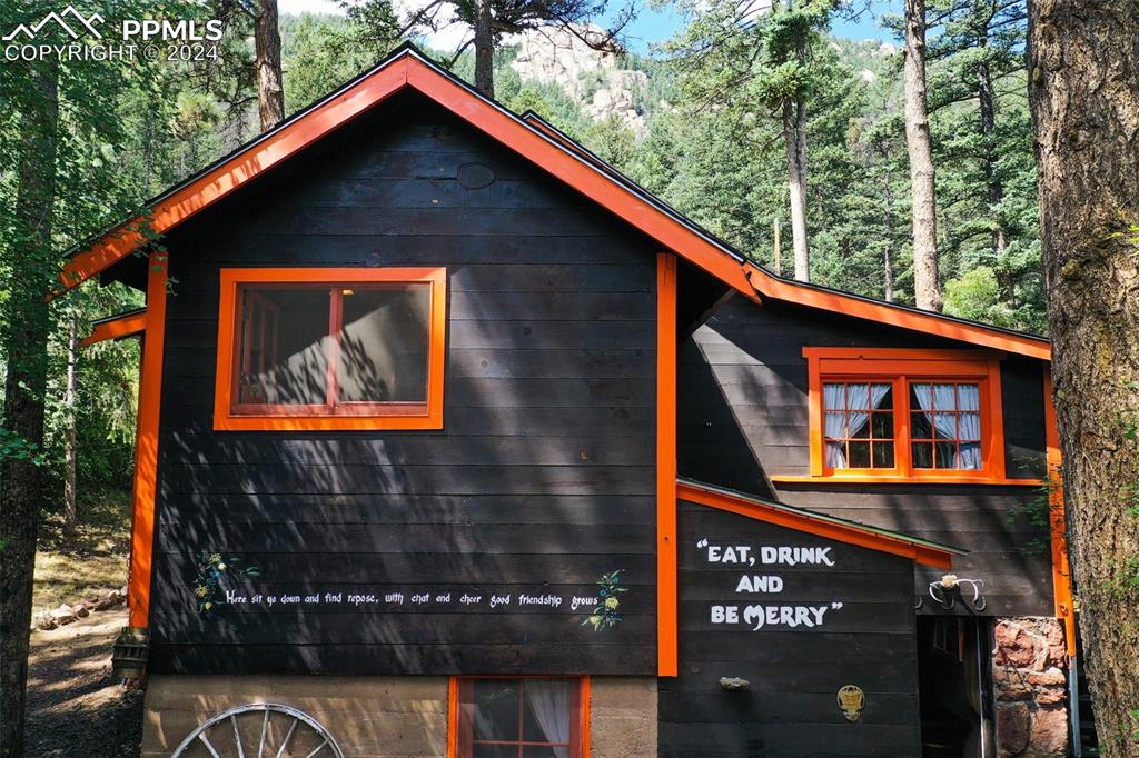 6015 Sioux Trail Cascade, CO 80809 - Photo 46 of 50 a view of a house with garage
