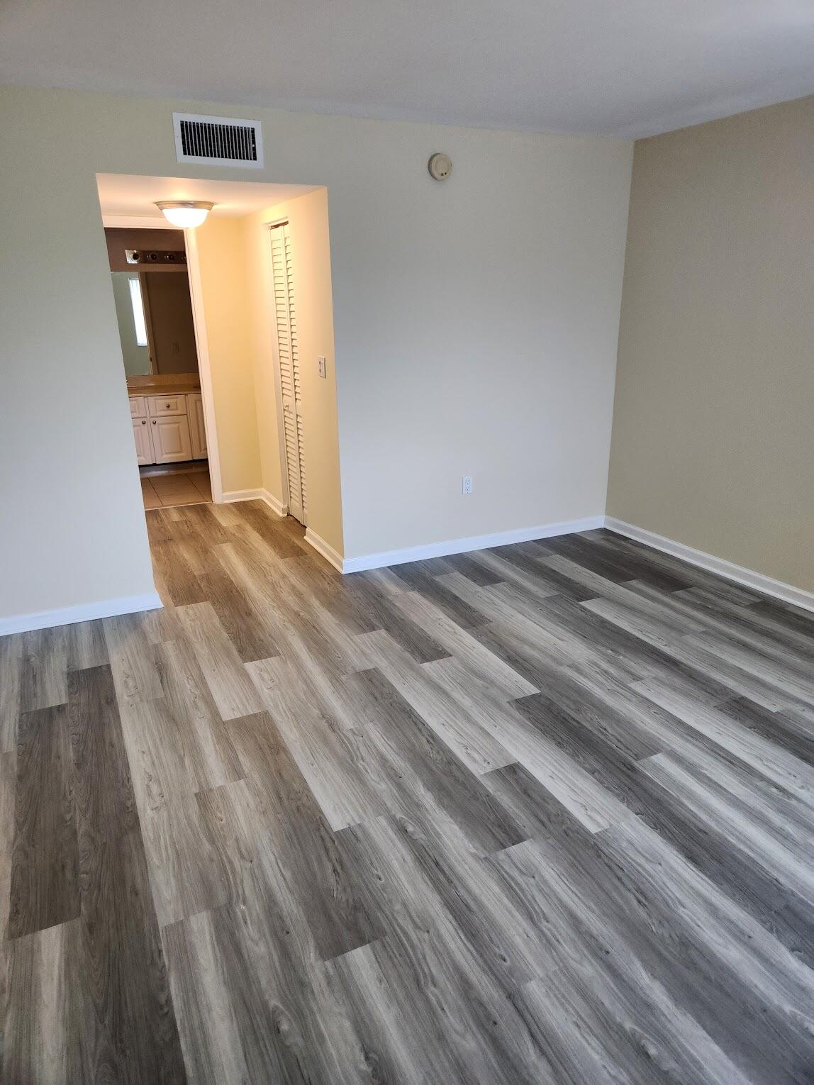 731 North Pine Island Road, Unit 402 Plantation, FL 33324 - Photo 5 of 11 a view of a room with wooden floor