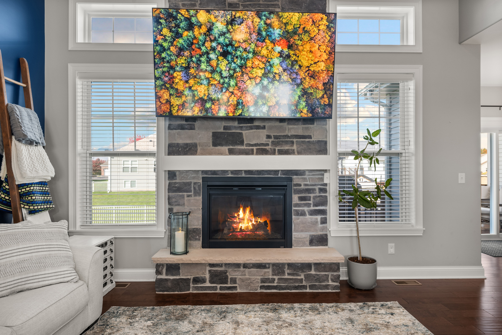 1435 Beach Lane Sycamore, IL 60178 - Photo 15 of 39 a living room with a fireplace windows and a fireplace