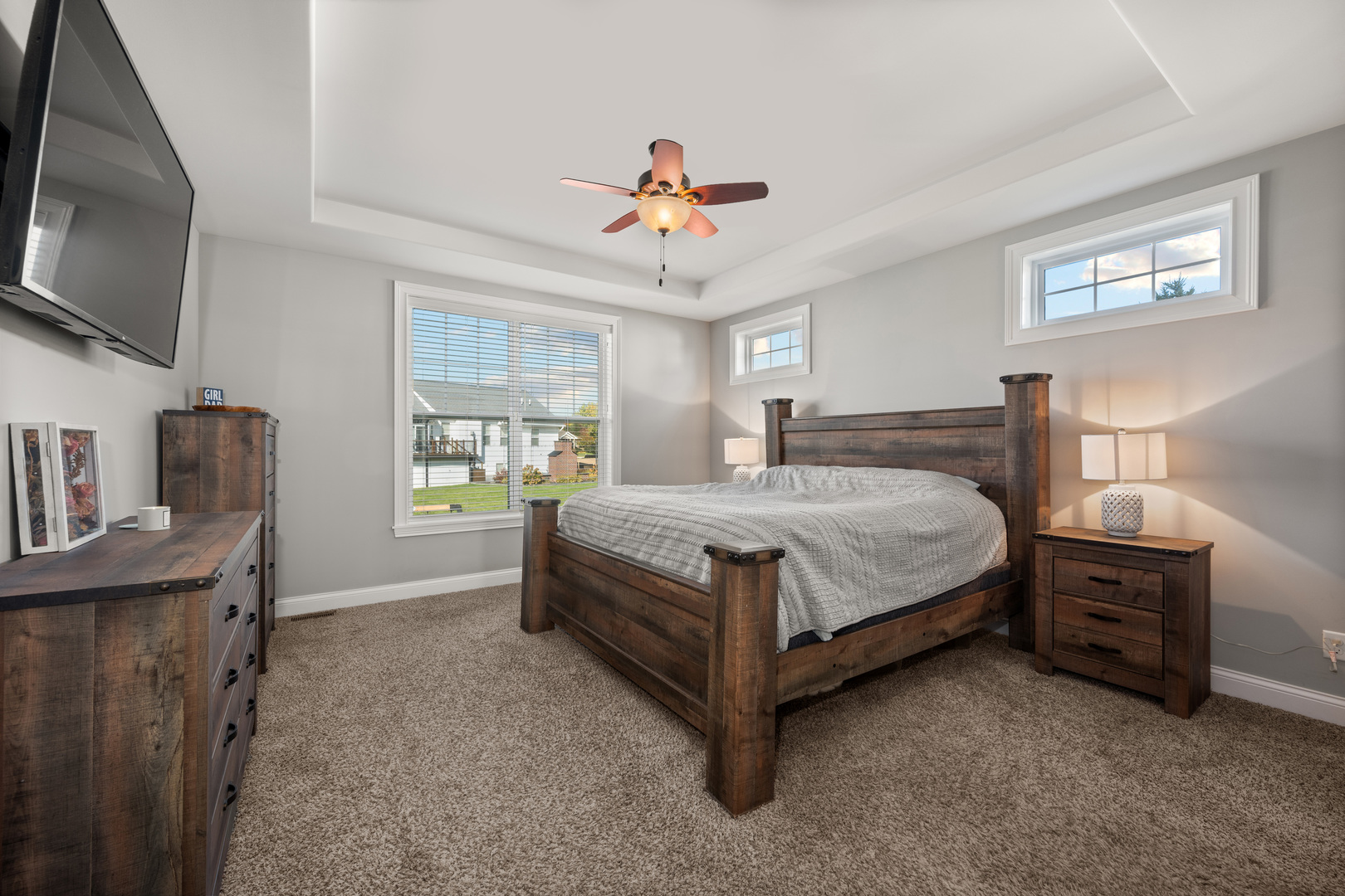 1435 Beach Lane Sycamore, IL 60178 - Photo 22 of 39 a bedroom with a bed and a flat tv screen on dresser