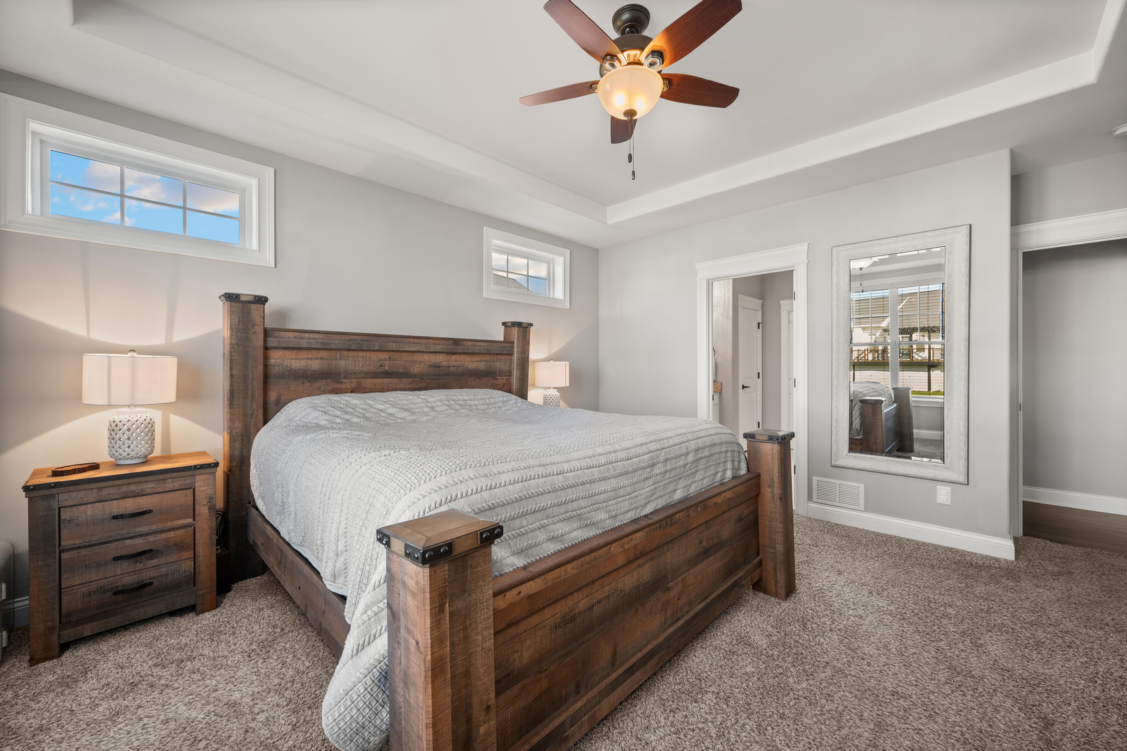 1435 Beach Lane Sycamore, IL 60178 - Photo 23 of 39 a bedroom with a bed and a chandelier