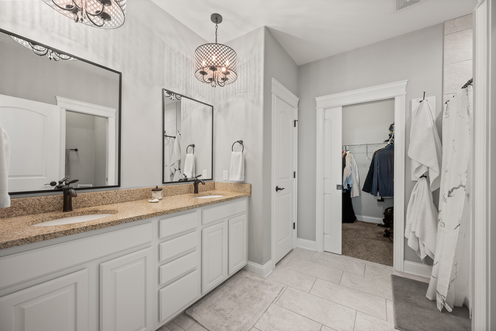 1435 Beach Lane Sycamore, IL 60178 - Photo 24 of 39 a spacious bathroom with a granite countertop sink and a mirror