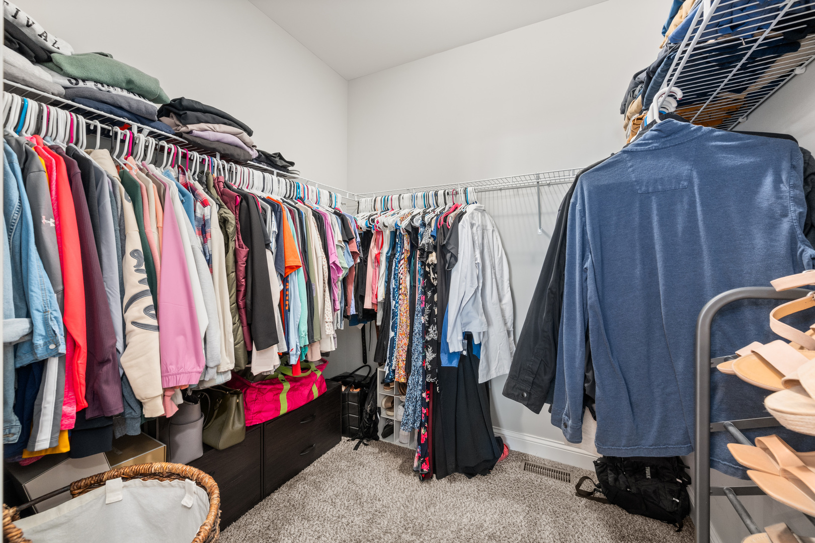 1435 Beach Lane Sycamore, IL 60178 - Photo 26 of 39 a view of walk in closet with clothes