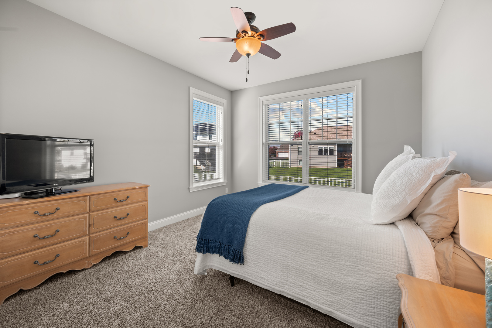 1435 Beach Lane Sycamore, IL 60178 - Photo 30 of 39 a bedroom with a bed and a flat screen tv