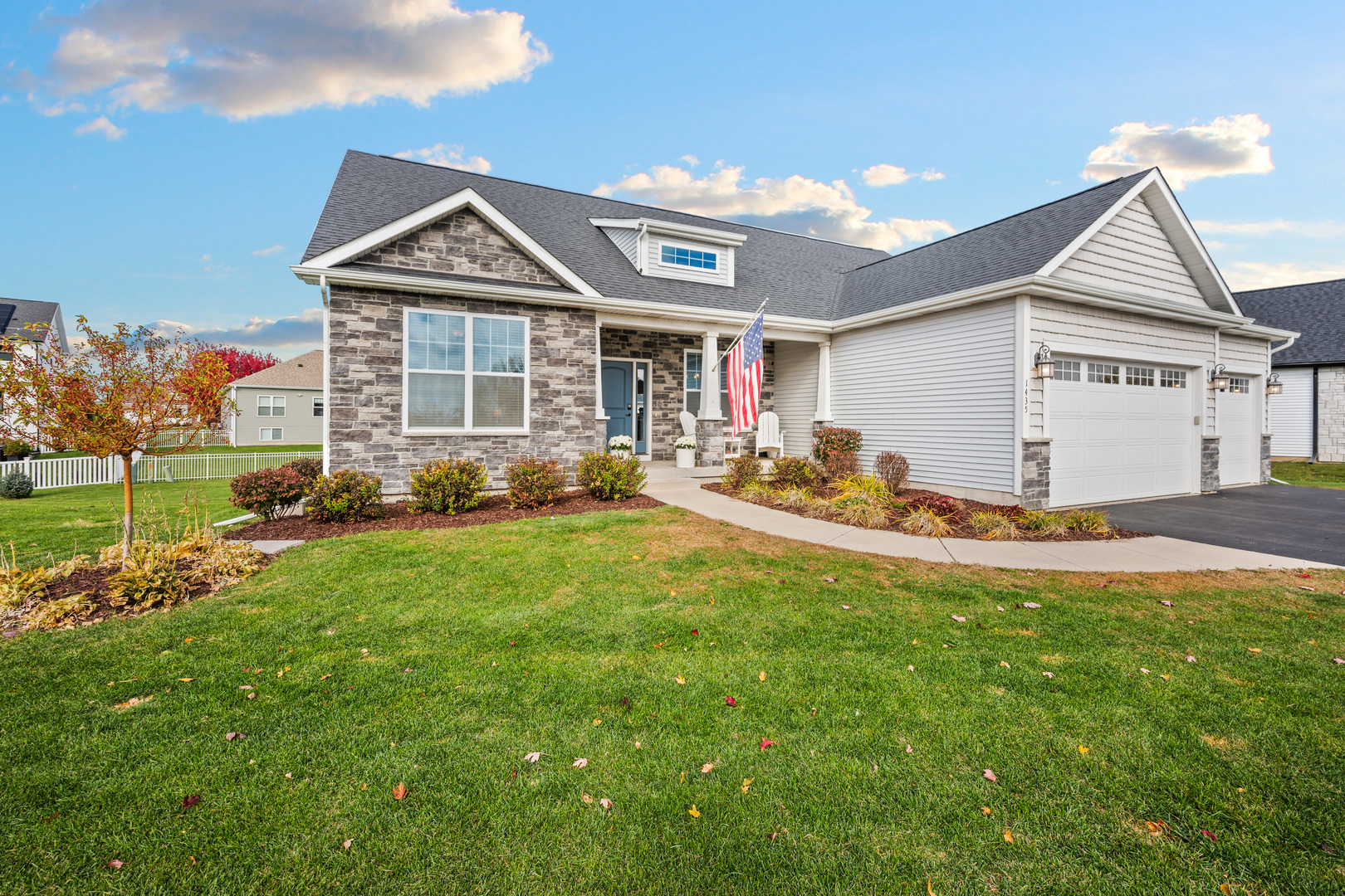 1435 Beach Lane Sycamore, IL 60178 - Photo 37 of 39 a front view of house with yard and outdoor seating
