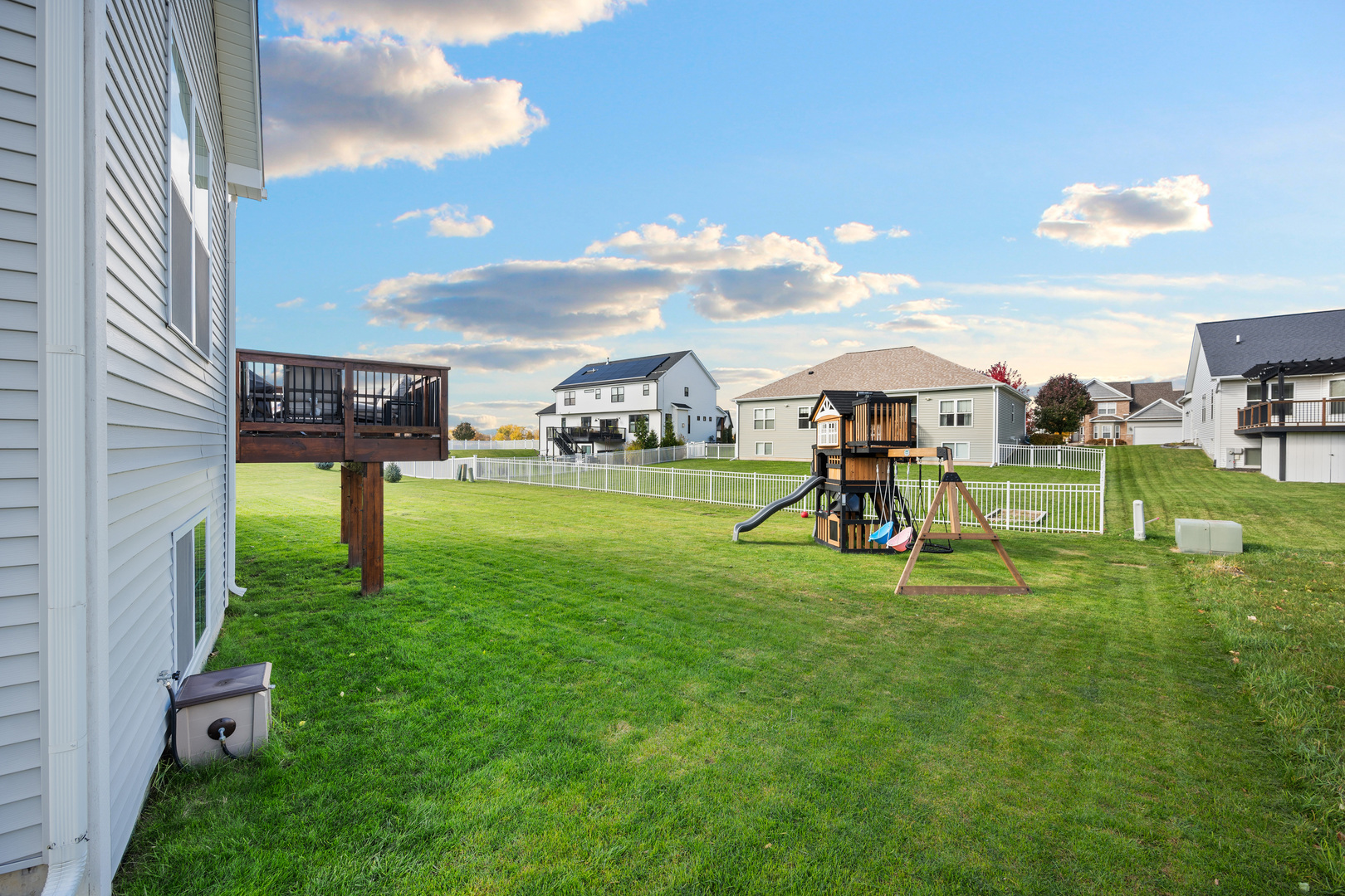 1435 Beach Lane Sycamore, IL 60178 - Photo 10 of 39 a view of a park with swings and slides