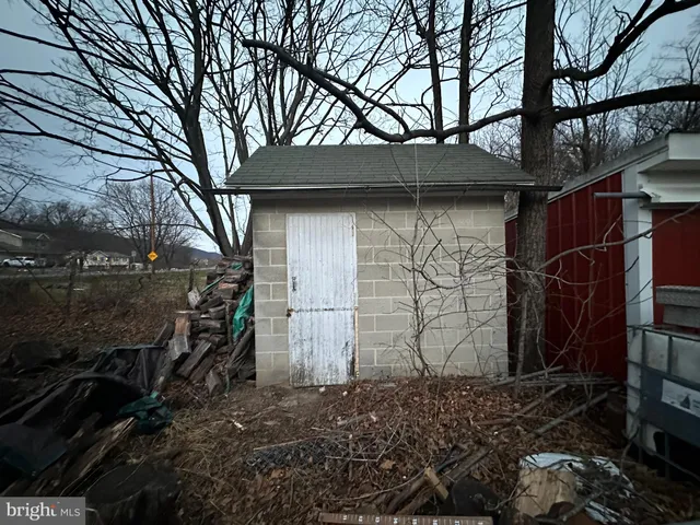 a kitchen with a sink appliances and cabinets