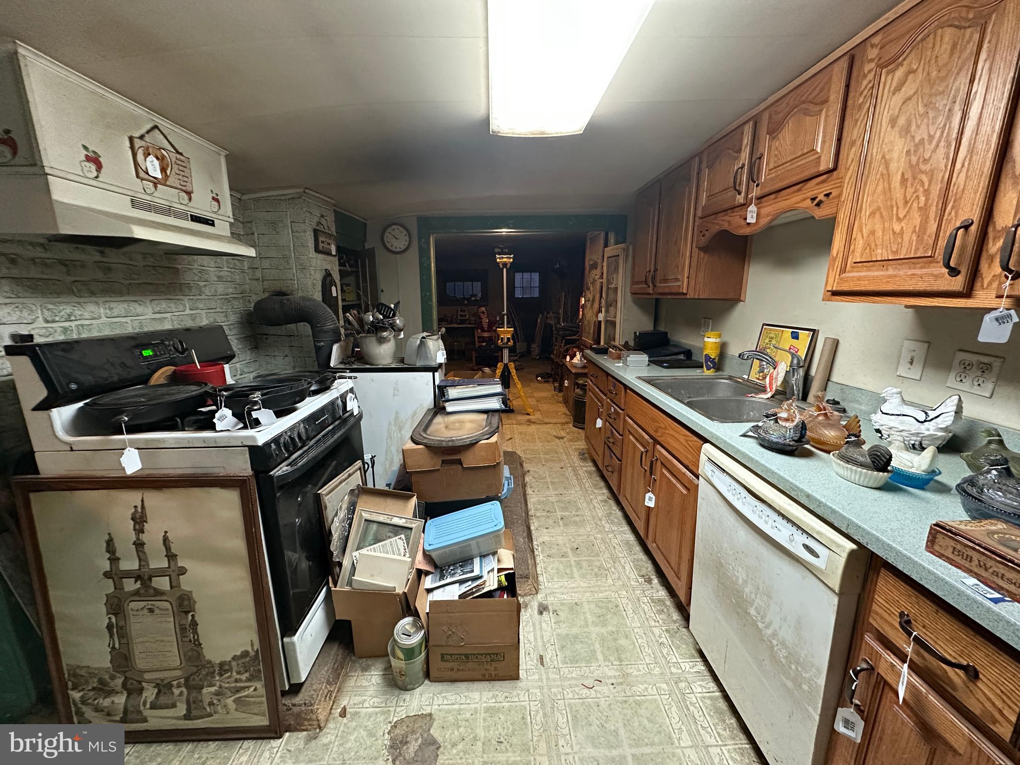 4344 Charlestown Road Mercersburg, PA 17236 - Photo 38 of 77 a kitchen with stainless steel appliances granite countertop a stove a sink and a refrigerator