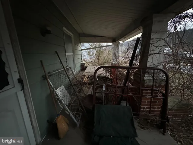 a front view of house with pathway and yard