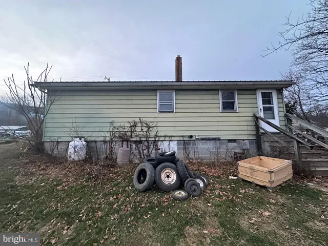 a view of outdoor space with trees all around