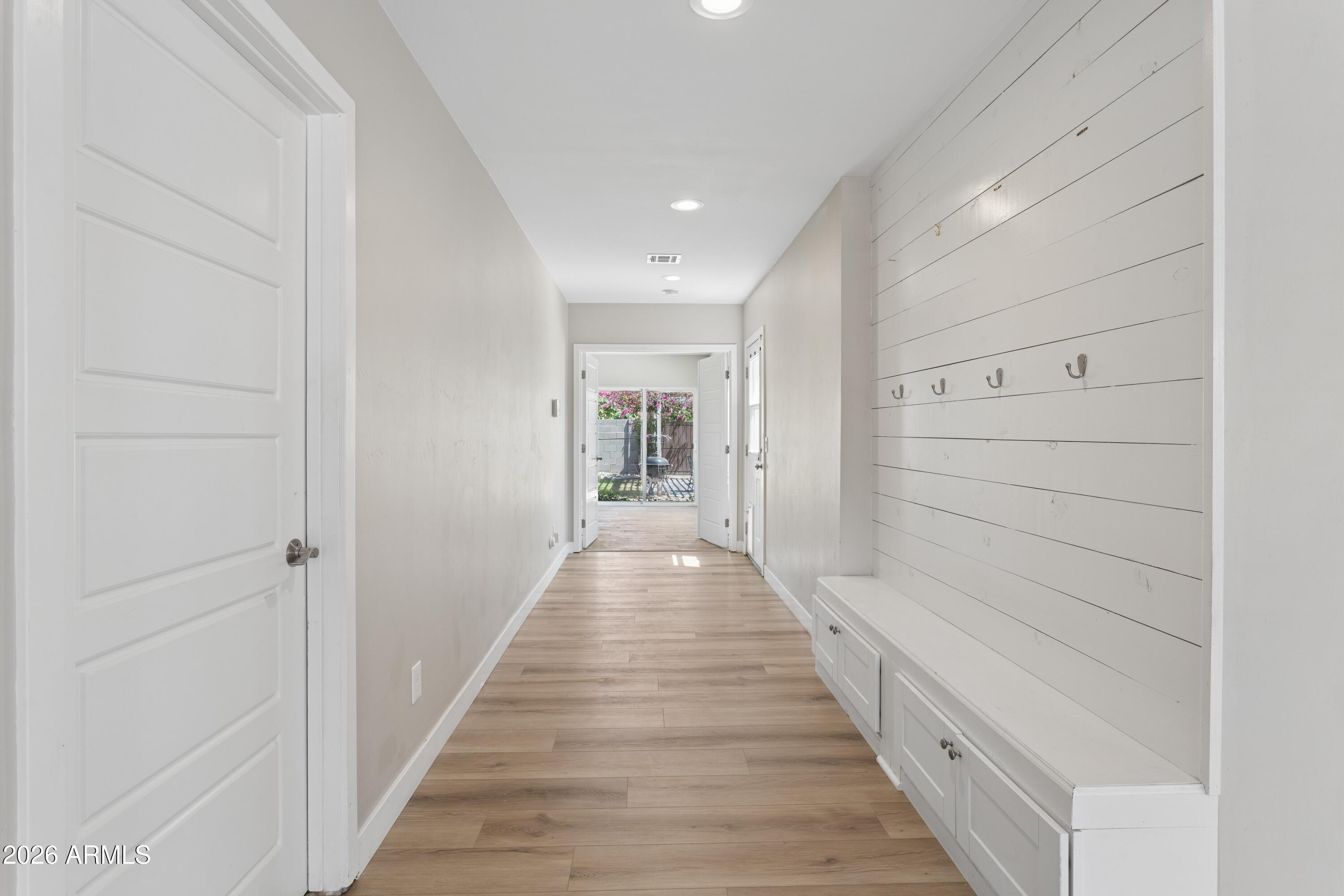 322 West Coronado Road Phoenix, AZ 85003 - Photo 18 of 93 a view of a hallway with wooden floor and staircase