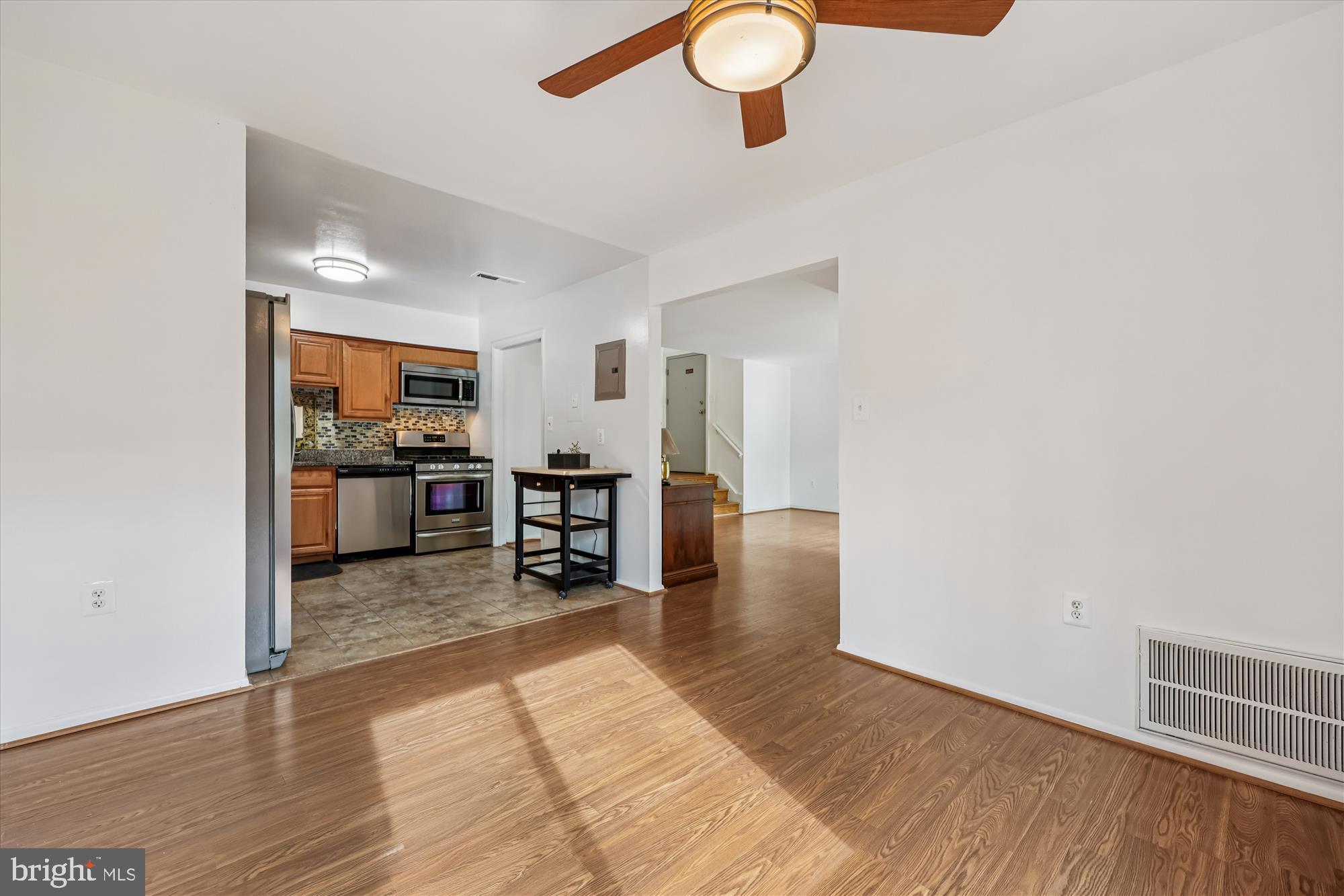 14428 Parkvale Road, Unit 3 Rockville, MD 20853 - Photo 17 of 37 a view of a kitchen with a sink and a window