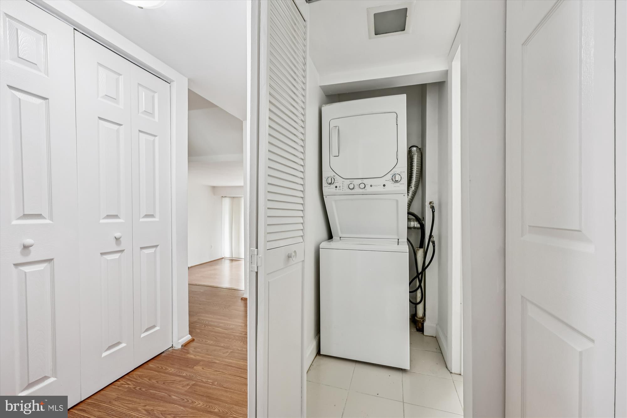 14428 Parkvale Road, Unit 3 Rockville, MD 20853 - Photo 21 of 37 a utility room with dryer and washer