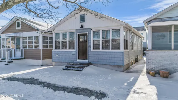 a front view of a house with a garage