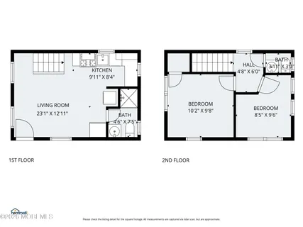 a black and white photo of a living room