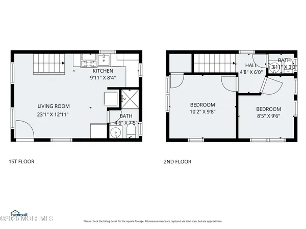 a black and white photo of a living room