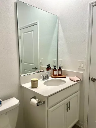 a bathroom with a sink and a toilet