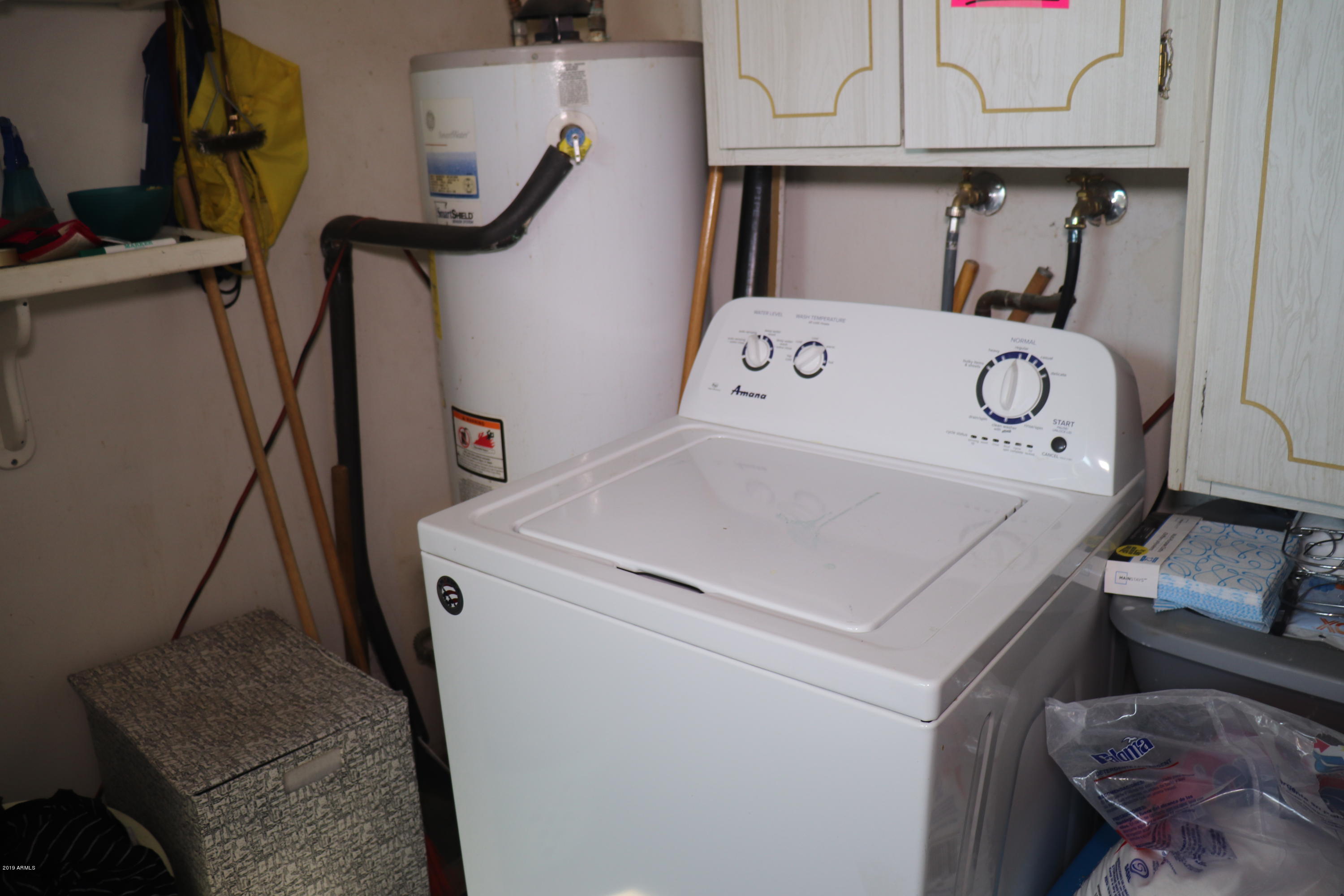 8233 West Osborn Road Phoenix, AZ 85033 - Photo 24 of 28 a utility room with dryer and washer