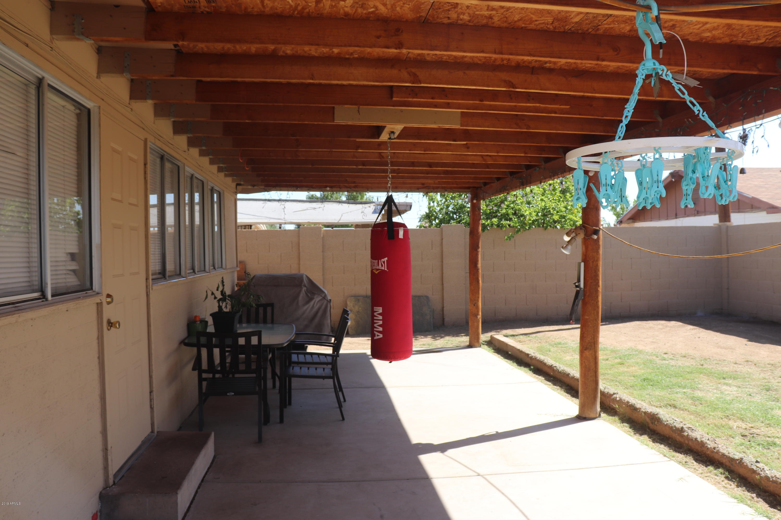 8233 West Osborn Road Phoenix, AZ 85033 - Photo 25 of 28 a view of porch with seating space
