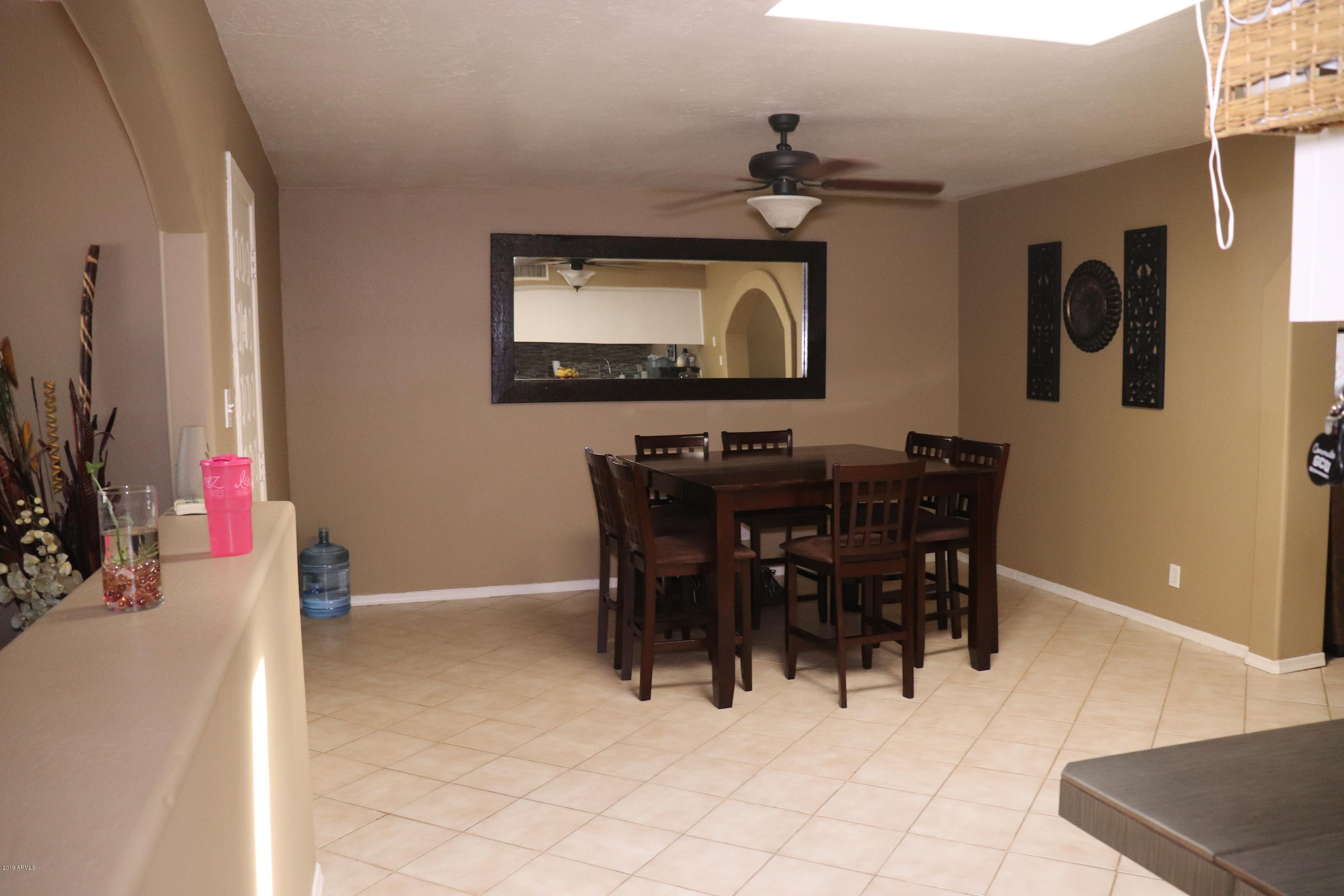 8233 West Osborn Road Phoenix, AZ 85033 - Photo 9 of 28 a dining room with furniture and window