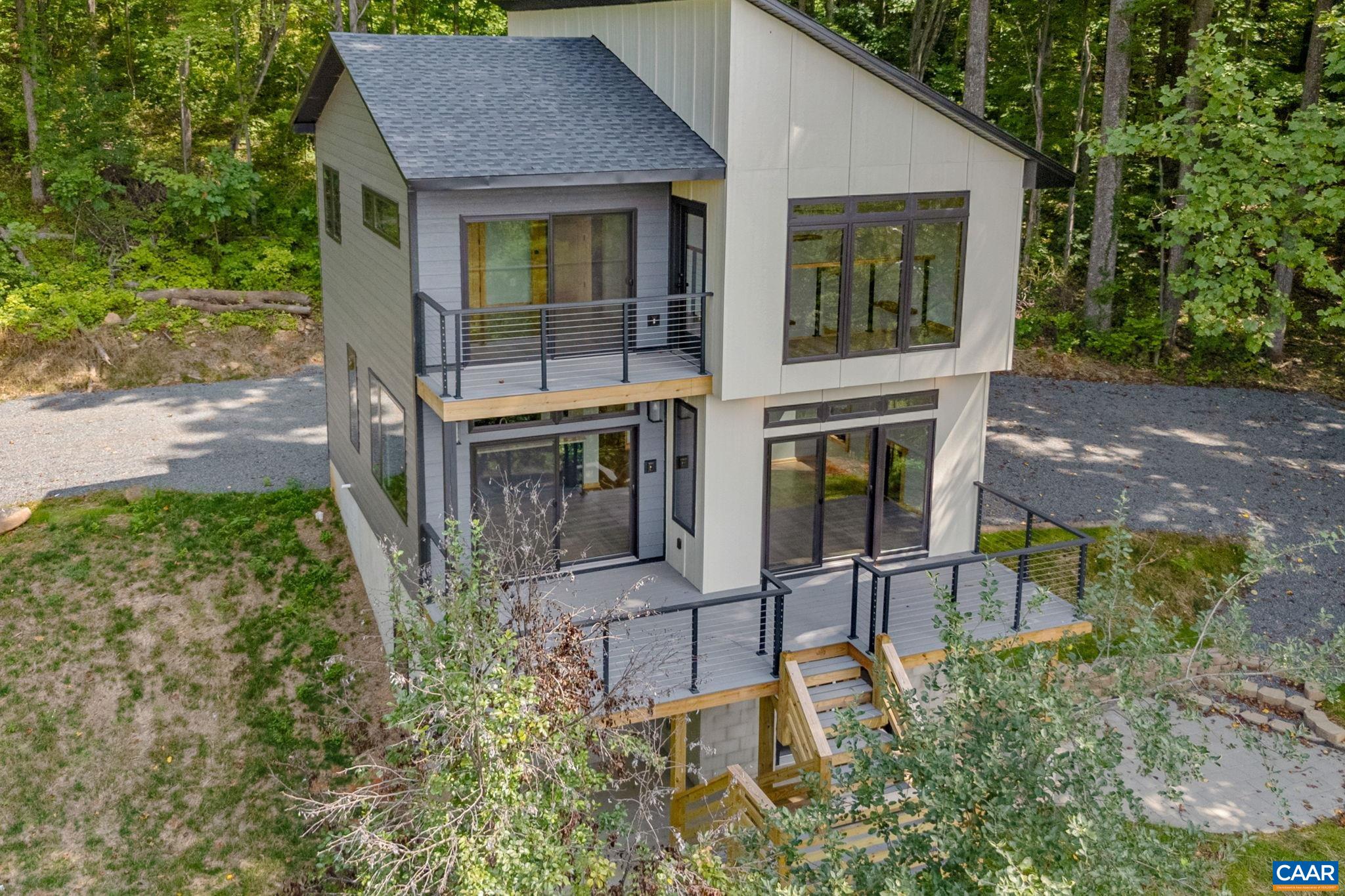 181 Turkey Ridge Road Stanardsville, VA 22973 - Photo 4 of 38 front view of a house with a yard