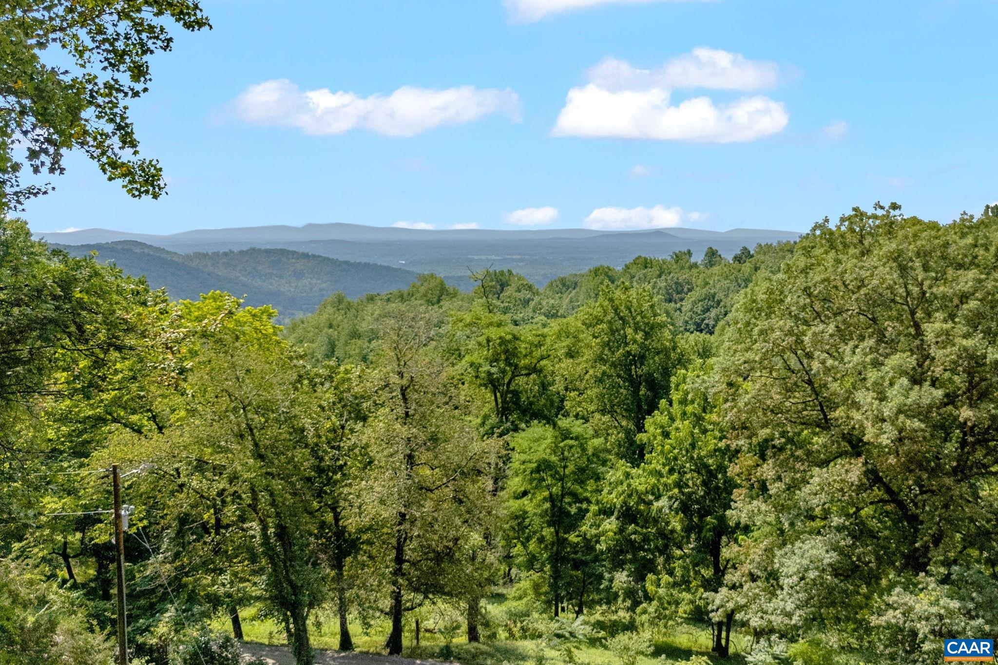 181 Turkey Ridge Road Stanardsville, VA 22973 - Photo 6 of 38 a view of a lake