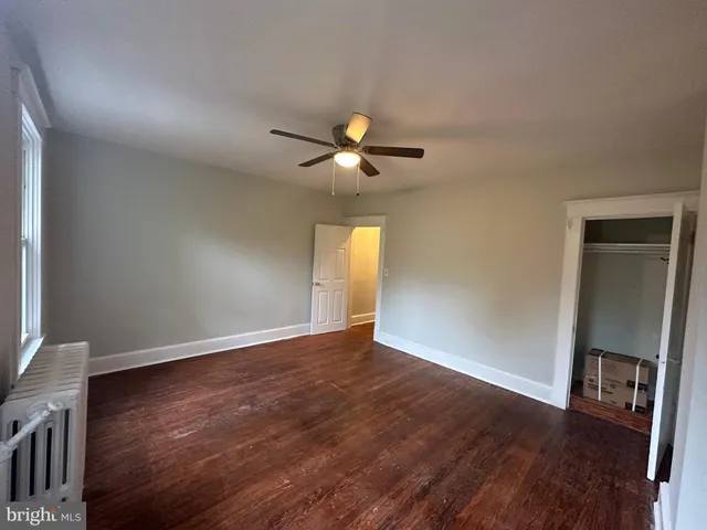 a kitchen with a refrigerator and a stove