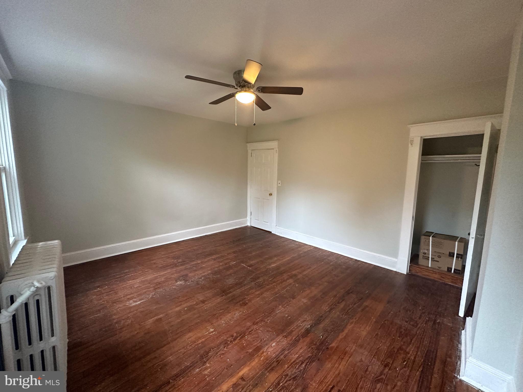 4227 Euclid Avenue, Unit B Baltimore, MD 21229 - Photo 18 of 87 a view of empty room with wooden floor
