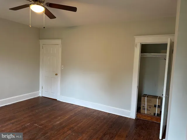 a kitchen with a refrigerator and a stove